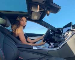 She likes riding her car and having a fun time while travelling.